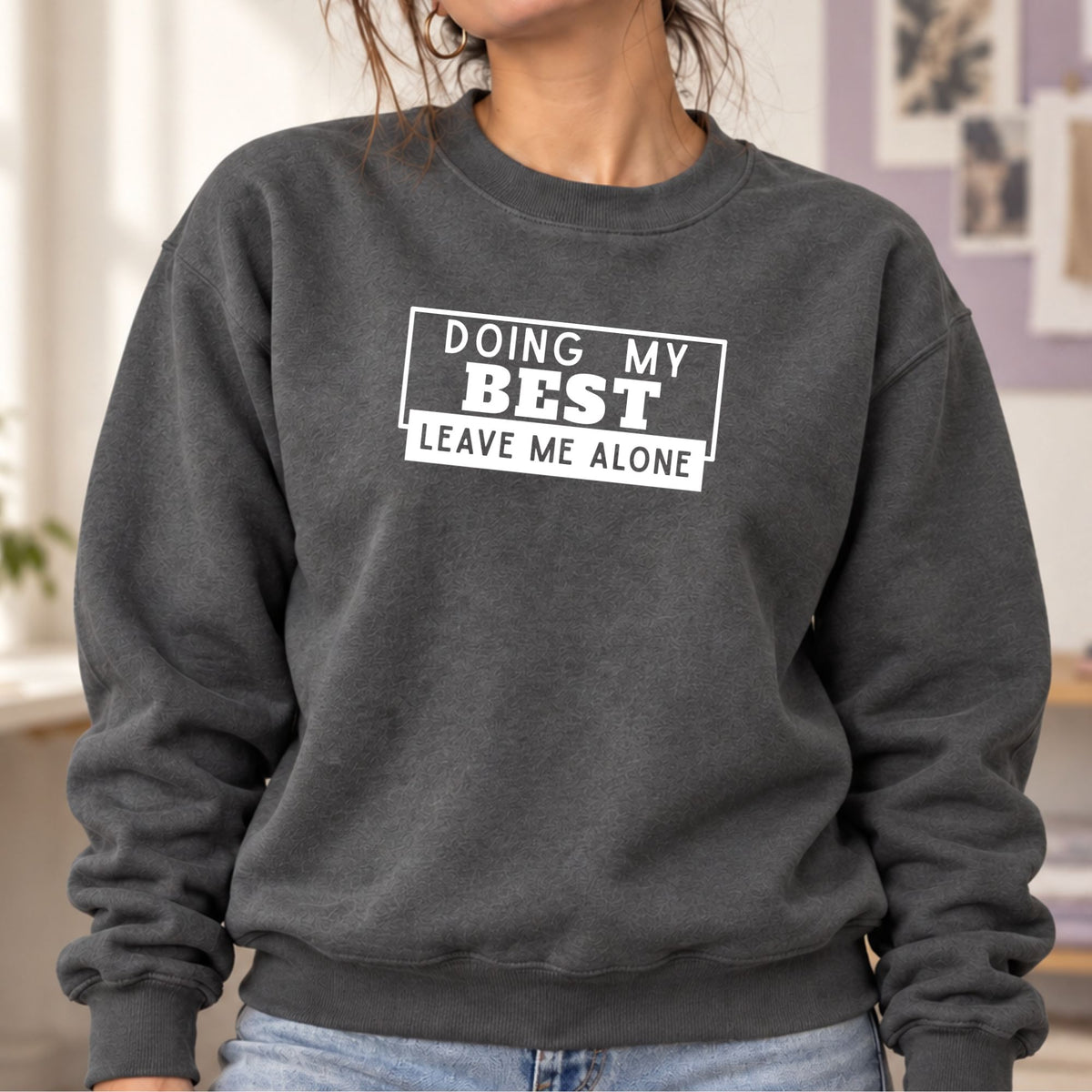 Woman wearing a charcoal Doing My Best Leave Me Alone adult crewneck sweatshirt