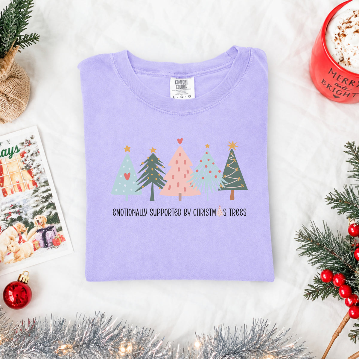 Emotionally Supported by Christmas Trees adult graphic tee in soft lavender, front flat lay