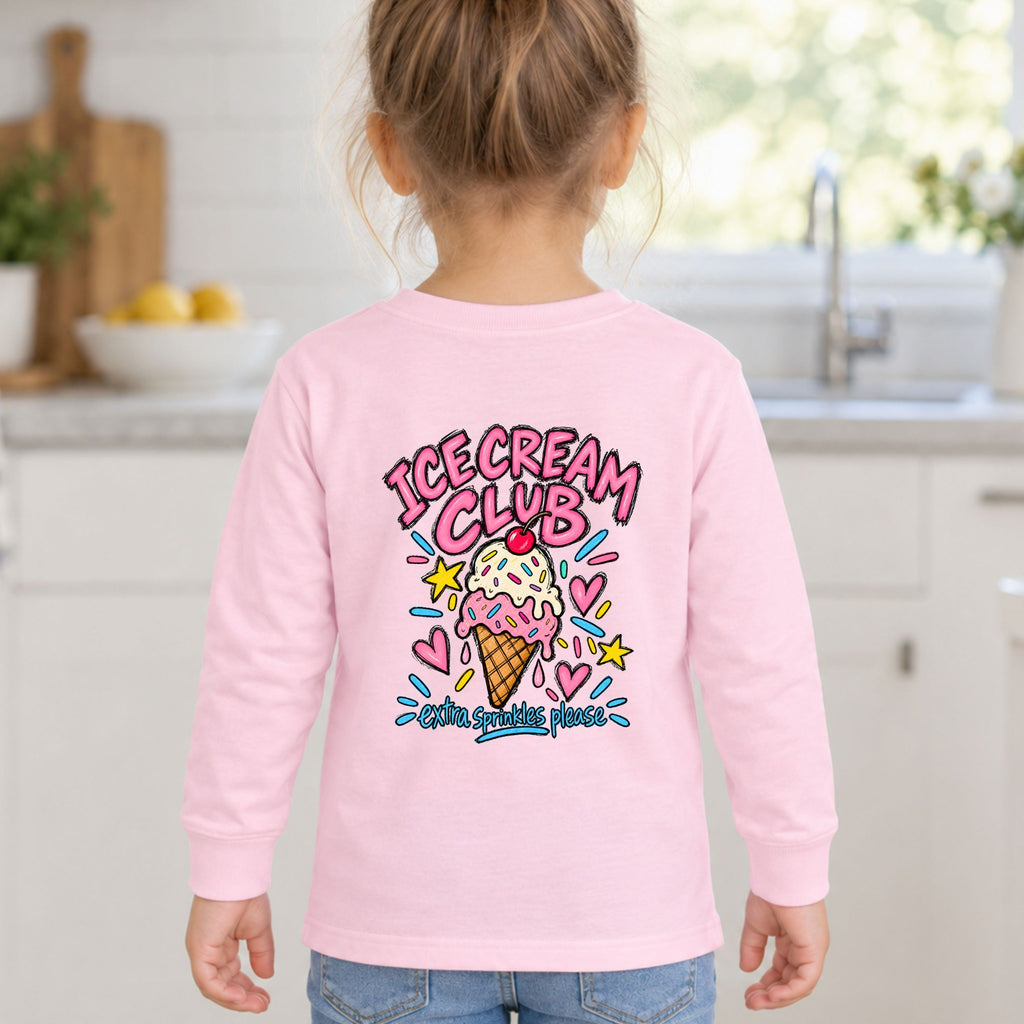 Girl wearing a pink Ice Cream Club toddler long sleeve tee, back view showing the Extra Sprinkles Please design.
