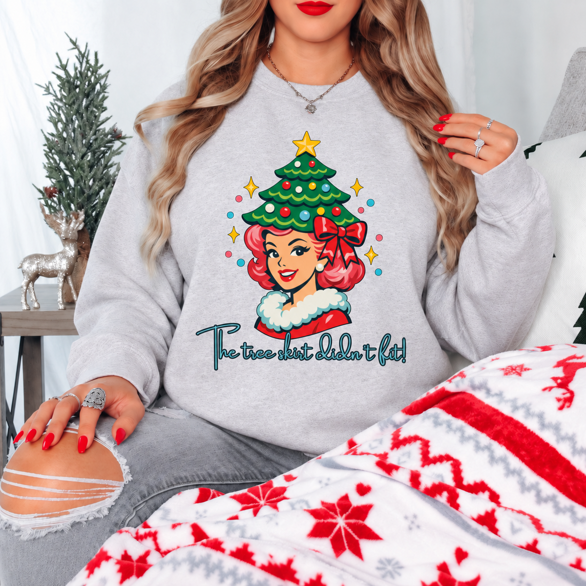 Woman wearing an ash gray The Tree Skirt Didn’t Fit funny Christmas crewneck sweatshirt